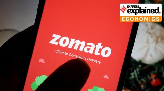 The logo of food delivery company Zomato is seen on its app on a mobile phone displayed in front of its company website in this illustration picture. (Reuters)