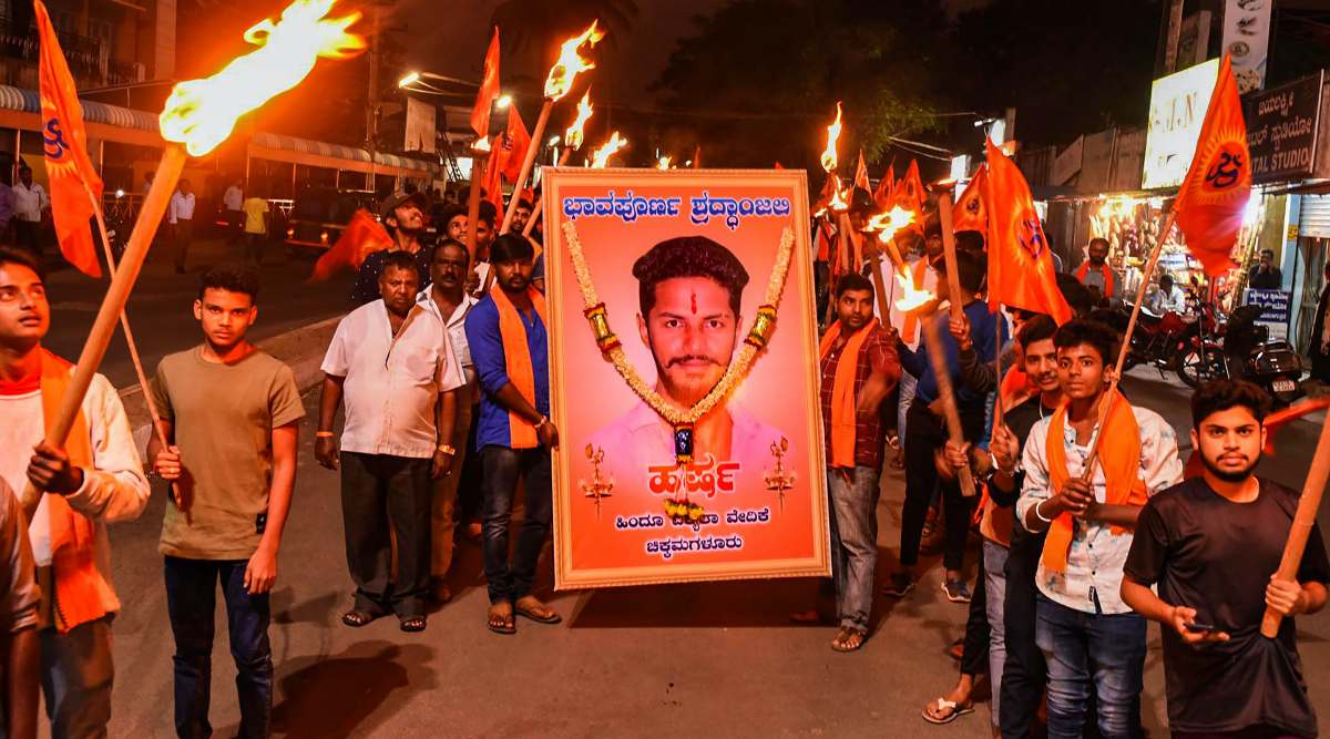 Members of various pro-Hindu organisations stage a protest march over the alleged murder of Bajrang Dal activist Harsha in Shivamogga, in Chikmagalur, February 21, 2022. (PTI)