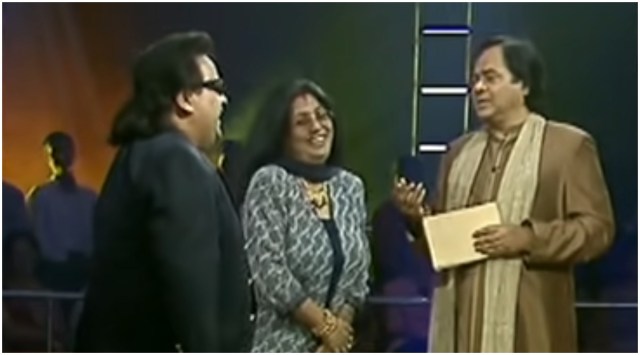Bappi Lahiri and his wife Chitrani with Farooq Shaikh on Jeena Isi Ka Naam Hai. (Photo: Zee TV/YouTube)