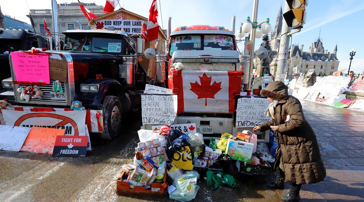 A person looks over the truckers' supplies as truckers and their supporters continue to protest coronavirus disease vaccine mandates, in Ottawa, Ontario, Canada, February 7, 2022. (Reuters)