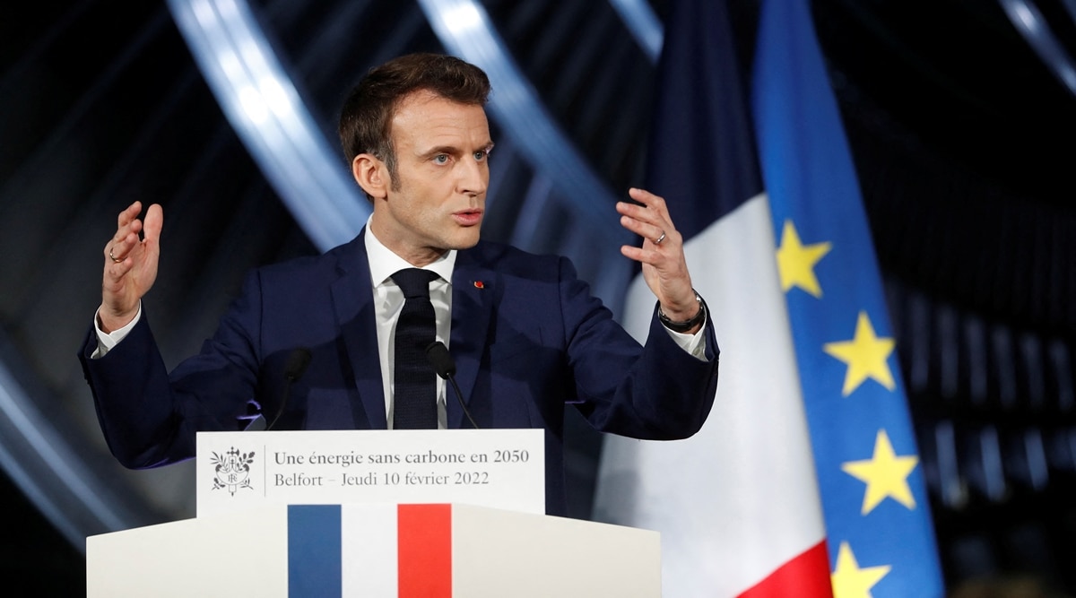French President Emmanuel Macron delivers a speech at the main production site of GE Steam Power System, where he unveiled plans to build new nuclear reactors in the country as part of its energy strategy to reduce planet-warming emissions, in Belfort, France, February 10, 2022. (Reuters)