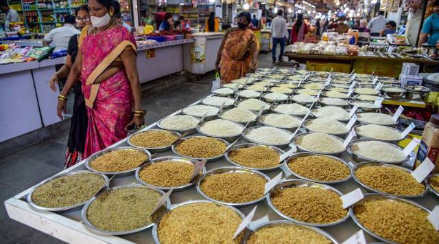 Customers at the grain market, on the day of presentation of the Union Budget 2022-23, in Navi Mumbai. (PTI Photo)