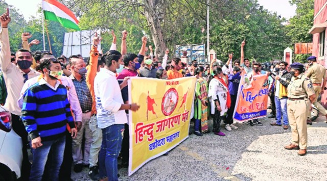 Members of the Hindu Jagran Manch and Vishwa Hindu Parishad protest in Vadodara on Monday. (Express Photo by Bhupendra Rana)