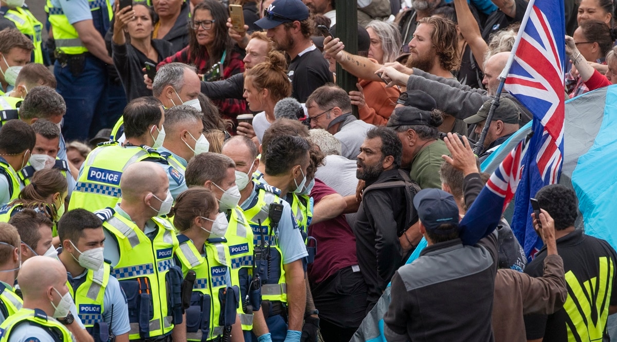 Police arrest people protesting against coronavirus mandates at Parliament in Wellington, New Zealand February 10, 2022. (AP)