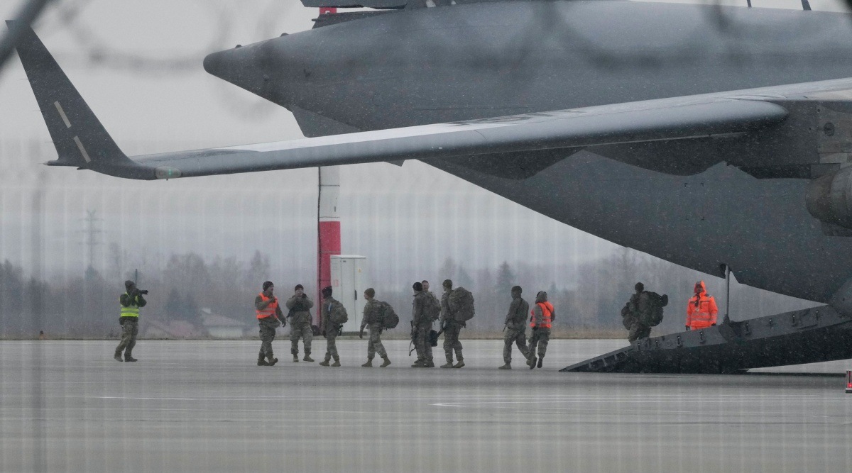 U.S. Army troops of the 82nd Airborne Division unloading vehicles from a transport plane after arriving from Fort Bragg, at the Rzeszow-Jasionka airport in southeastern Poland, Sunday, Feb. 6, 2022. Additional U.S. troops are arriving in Poland after President Joe Biden ordered the deployment of 1,700 soldiers here amid fears of a Russian invasion of Ukraine. Some 4,000 U.S. troops have been stationed in Poland since 2017. (Photo: AP/PTI)
