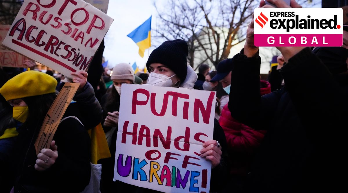 A demonstration near the Russian embassy in Berlin, Germany on Tuesday, Feb. 22, 2022. (AP Photo/Markus Schreiber)