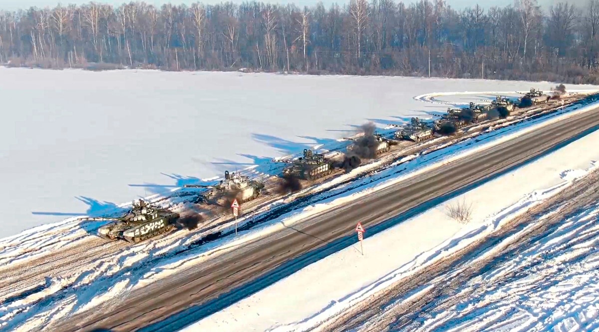 In this photo taken from video provided by the Russian Defense Ministry Press Service February 15, 2022, Russian army tanks move back to their permanent base after drills in Russia. (AP)