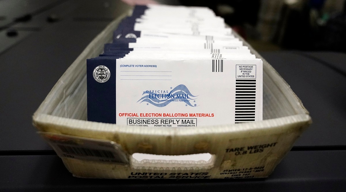 October 23, 2020 file photo showing mail-in ballots for the US 2020 General Election before being sorted at the Chester County Voter Services office in West Chester, Pennsylvania. (AP)