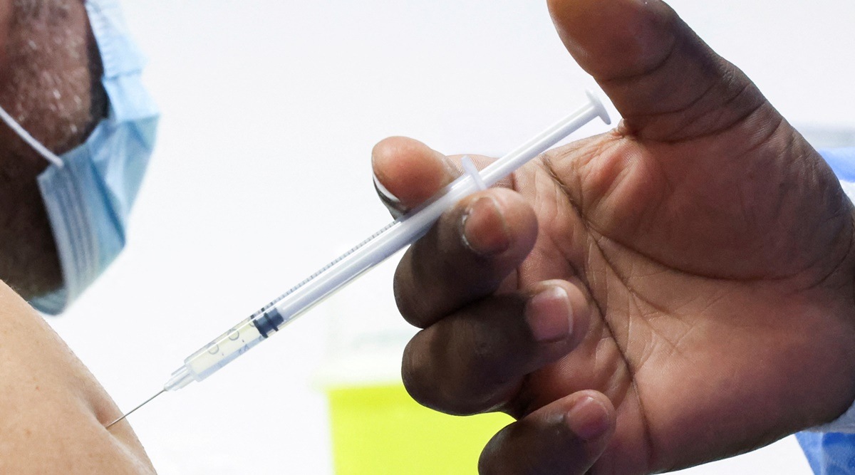 A man receives a booster dose of Pfizer's coronavirus disease (COVID-19) vaccine. (File/Reuters)