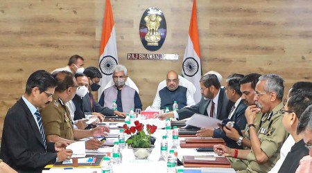 Union Home Minister Amit Shah with J&K Lt. Governor Manoj Sinha and other dignitaries, during a meeting to review the security situation in Jammu and Kashmir, in Jammu. (PTI)