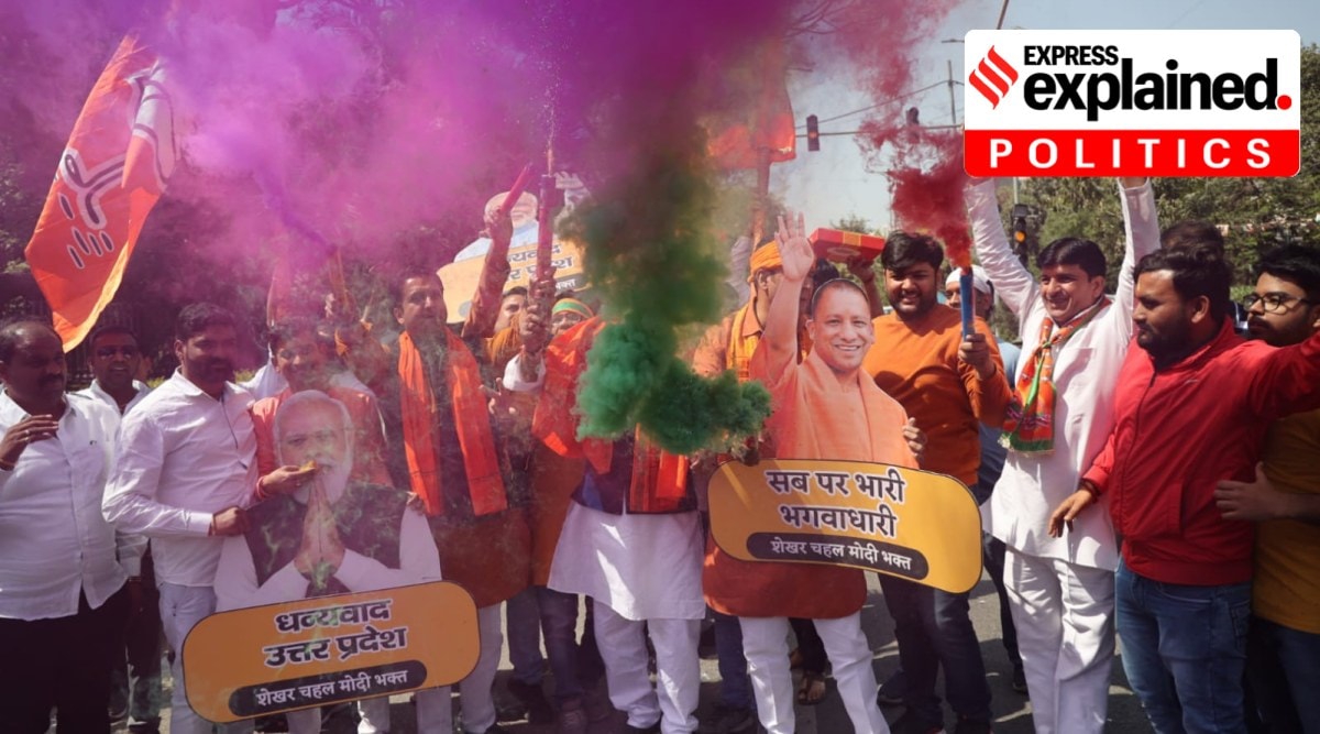 Supporters celebrate at the BJP HQ in New Delhi on Thursday. (Express Photo: Tashi Tobgyal)
