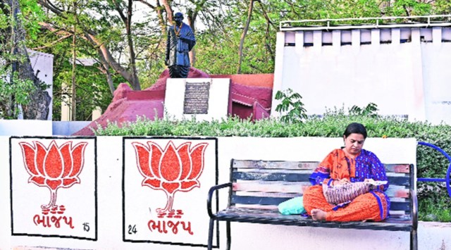 BJP’s Gujarat poll drive: Painting lotus symbol on public walls