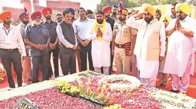 Punjab CM Bhagwant Mann pays tribute to freedom fighters in Hussainiwala on Wednesday. (Express Photo)