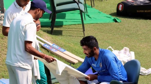 Jasprit Bumrah giving autographs to net bowlers during Indian team’s practice session at PCA Stadium in Mohali ahead of the Test match
against Sri Lanka. (Photo by Kamleshwar Singh)