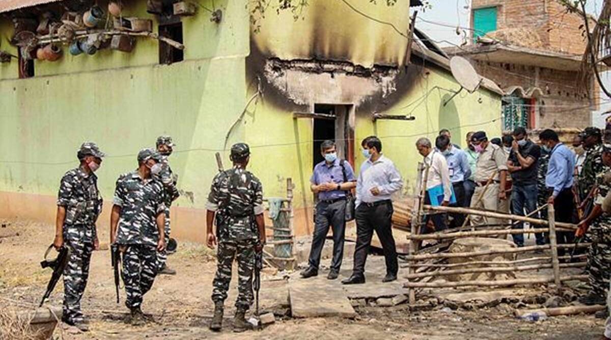 Central Bureau of Investigation (CBI) officers with CFSL team investigate near the house where eight people were burnt alive, at Bogtui village in Birbhum district of West Bengal, Saturday (PTI/File)