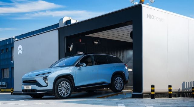 Four companies - automakers Nio and Geely, battery swap developer Aulton and state-owned oil producer Sinopec - say they plan to establish a total of 24,000 swap stations across the country by 2025, up from about 1,400 today. Pictured here is a Nio battery-swapping station in Lianyungang, China. (Image credit: Nio)