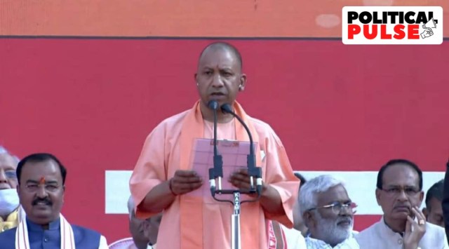 Uttar Pradesh Chief Minister Yogi Adityanath taking the oath for his second term in the office. 