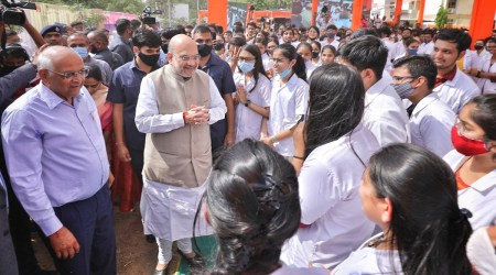 Union Home Minister Amit Shah and Gujarat CM Bhupendra Patel at Sola Civil Hospital, Saturday. (Nirmal Harindran)