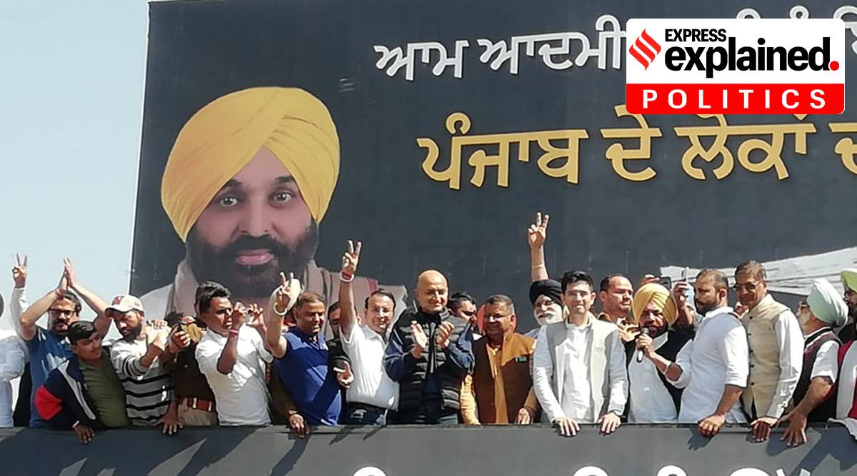 Aam Aadmi Party members celebrate after Punjab Elections results on Thursday.