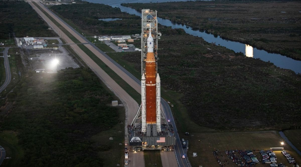 NASA’s Space Launch System (SLS) rocket, with the Orion capsule atop, slowly makes its way down the crawlerway at the agency’s Kennedy Space Center in Florida. (Image credit: NASA/Kim Shiflett) 