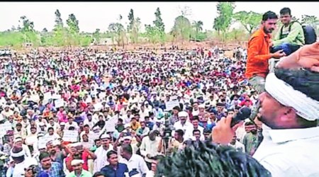At a meeting by the tribal community members in Valsad on Monday. (Express Photo)