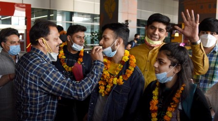 Relatives greet the students, evacuated from war-torn Ukraine, upon their arrival at the Indira Gandhi International Airport, in New Delhi, Tuesday, March 01, 2022. (PTI Photo)