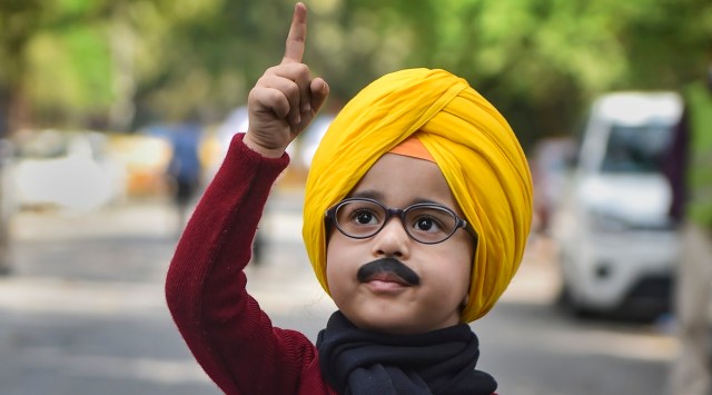 A child dressed as AAP's Punjab CM candidate Bhagwant Mann on the counting day of Punjab Assembly polls. (PTI)