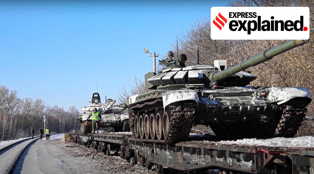 Russian army tanks are loaded onto railway platforms after drills near Ukraine. (AP Photo/File)