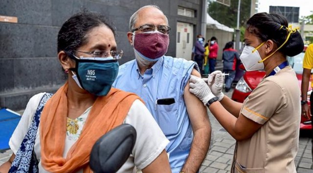 A healthworker administers a dose of a Covid-19 vaccine in Chennai. (PTI)