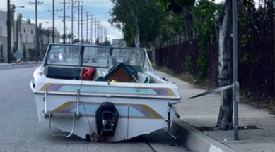 boat tied to no parking, boat, no parking, boat on road, indian express