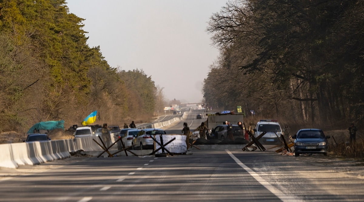 A Ukrainian checkpoint along the highway in Brovary, Ukraine, Friday, March 11, 2022. (Lynsey Addario/The New York Times) 
