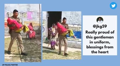 UP police help elderly cast vote, Uttar Pradesh Police Twitter, UP Police, UP elections, Indian Express