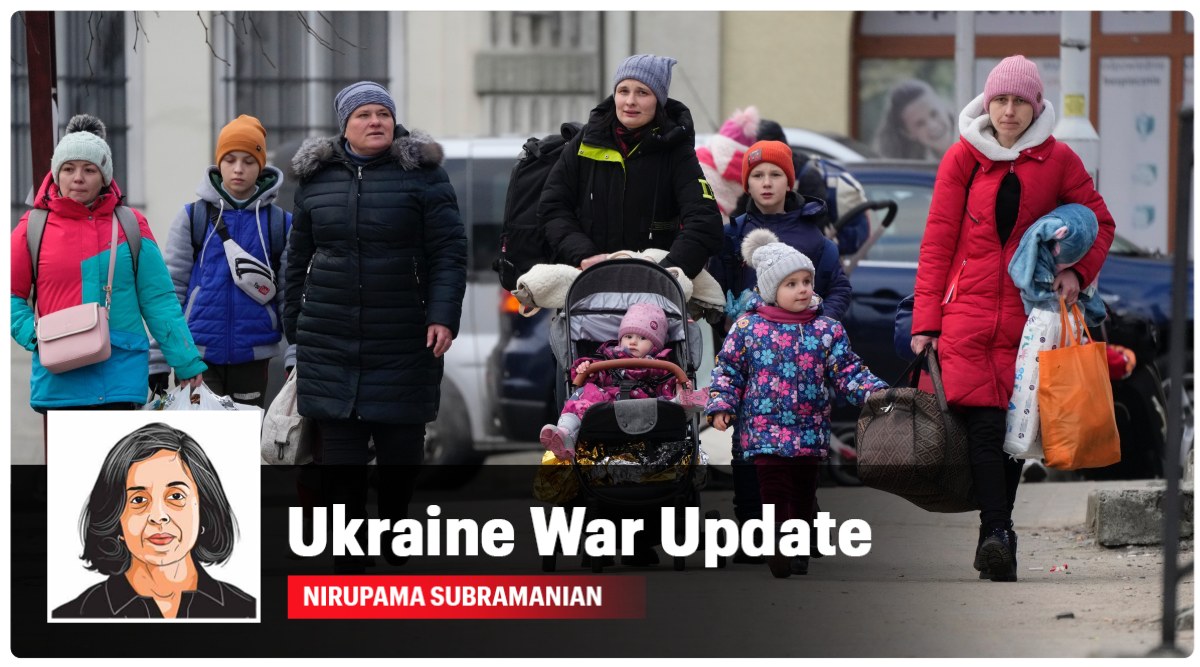 Women and children, fleeing from Ukraine, arrive on the platform of the train station in Przemysl, Poland, after disembarking from a bus which traveled from the border, Tuesday, March 8, 2022. (AP Photo/Markus Schreiber)
