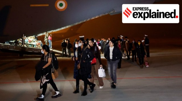 Students who were evacuated from Ukraine arrive at Hindon Air Force Station in Ghaziabad, Uttar Pradesh by an Indian Air Force aircraft. (Express Photo: Praveen Khanna)