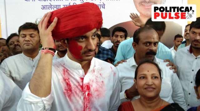 Parth Pawar with supporters to celebrate his birthday and Holi at Rahatni on Thursday. (Express Photo)