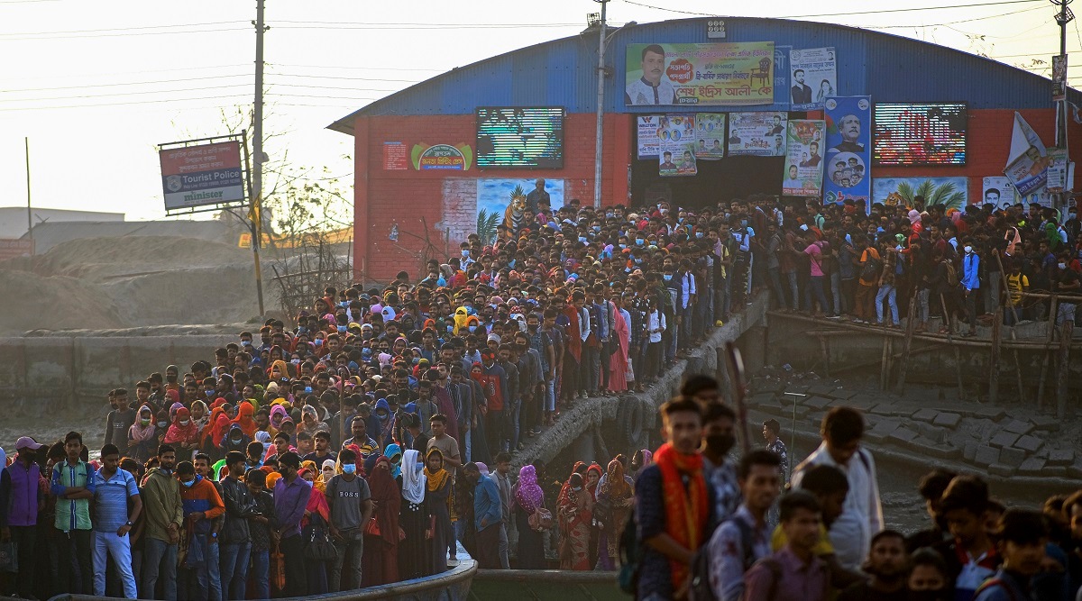 Workers gather in the morning at a boat terminal waiting to cross the Mongla river in Mongla, Bangladesh. (AP)