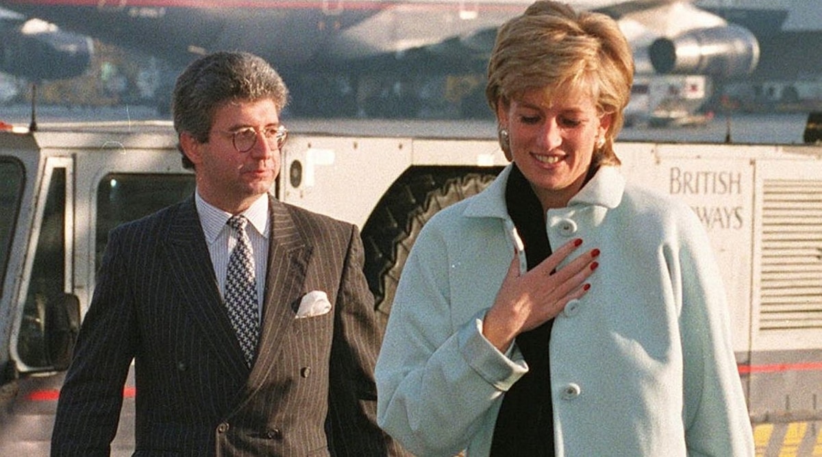 Britain's Princess Diana (late) and her Private Secretary Patrick Jephson at Heathrow Airport in London, December 11, 1995 (Tim Ockenden/PA via AP, file)