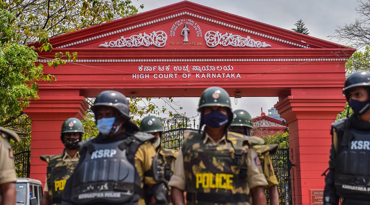 Police outside the High Court in Bengaluru on Tuesday. (PTI)