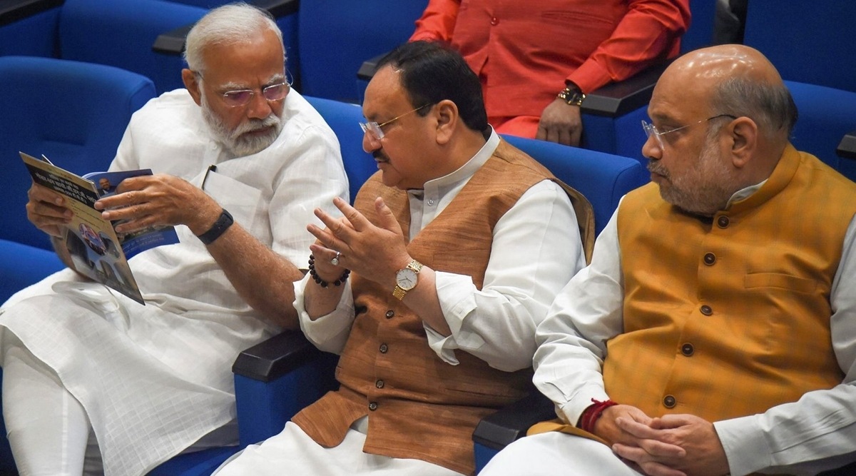 Prime Minister Narendra Modi interacts with BJP president JP Nadda and Union Home Minister Amit Shah, during the BJP Parliamentary party meeting in New Delhi, Tuesday (PTI /Shahbaz Khan)