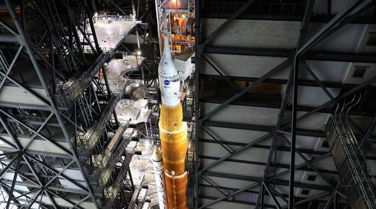 NASA's next-generation moon rocket, the Space Launch System (SLS) rocket with its Orion crew capsule perched on top, is seen in the Vehicle Assembly Building (VAB) before it is scheduled to make a slow-motion journey to its launch pad at Cape Canaveral, Florida, U.S. March 16, 2022. REUTERS/Thom Baur