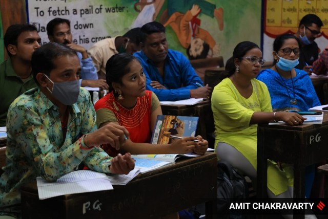 Students at a night school in Mumbai. (Express photo by Amit Chakravarty)