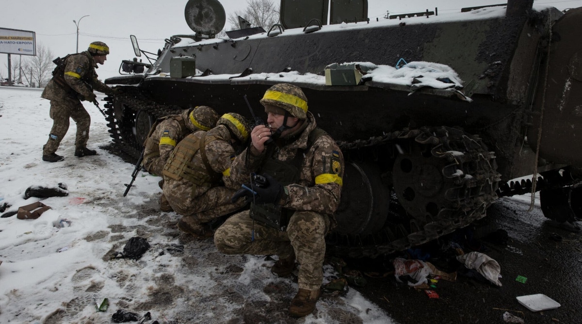 Ukrainian troops after a fierce battle with Russian forces in Kharkiv last week. The Ukrainians have done better than expected in repelling the invaders. (Credit:Tyler Hicks/The New York Times)