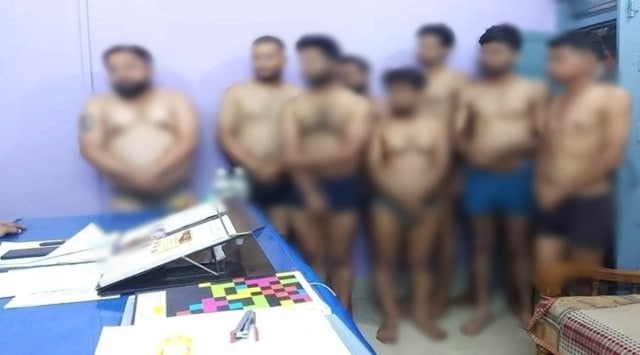 The MP Police on Thursday ordered an internal inquiry after a photograph of eight men, including a YouTuber, stripped down to their undergarments and standing at Kotwali Police Station in Sidhi district went viral on social media. (Photo: SM/Viral)