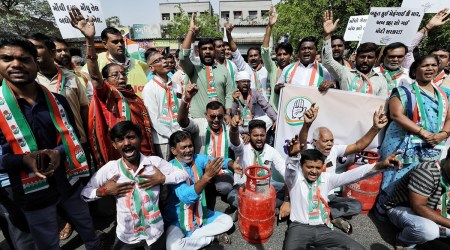 Congress workers bring empty LPG cylinders and hard paper cutout of Fuel dispenser at Amraiwadi during their protest against rising fuel and cooking gas prices . (Express Photo by Nirmal Harindran)
