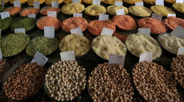 Price tags are seen on the samples of rice and lentils that are kept on display for sale at a wholesale market in the old quarters of Delhi, India, June 7, 2018. (REUTERS/File Photo)