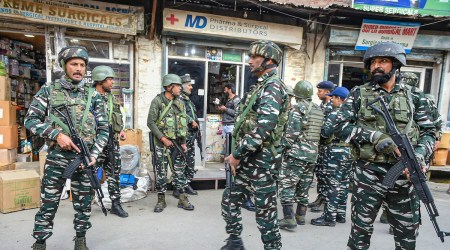 CRPF personnel stand guard after an attack by militants at Maisuma area of Srinagar. (PTI)