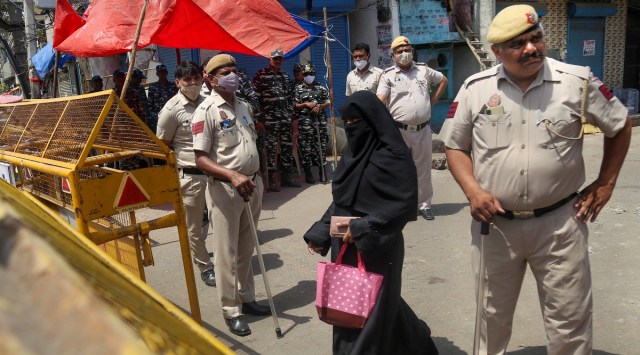 Policemen patrol the violence-hit Jahangirpuri area in New Delhi days after the demolition drive. (PTI)