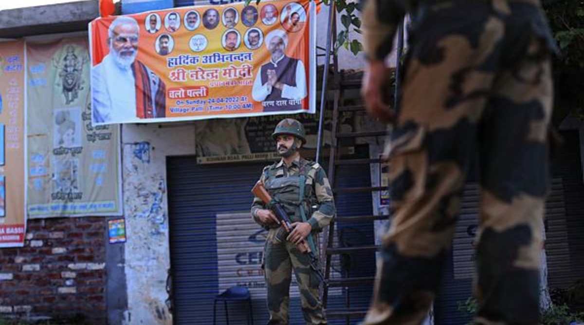 Border Security force (BSF) jawans stand guard near the venue of Prime Minister Narendra Modi's upcoming rally at Palli village of Samba district, Saturday, April 23, 2022. (PTI Photo)