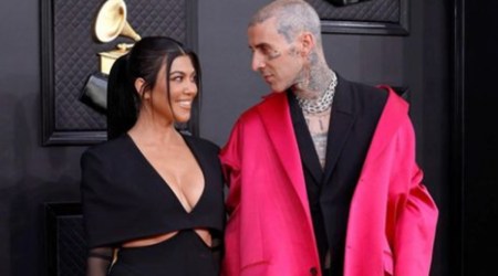 Kourtney Kardashian, Kourtney Kardashian news, Travis Barker news, Kourtney Kardashian Travis Barker Grammy Awards, Kourtney Kardashian Travis Barker fashion, indian express news
