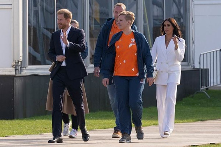 Meghan Markle, Meghan Markle news, Meghan Markle in Europe, Meghan Markle fashion, Meghan Markle back in Europe, Meghan Markle Invictus Games, Meghan Markle Valentino, Meghan Markle pantsuit, indian express news